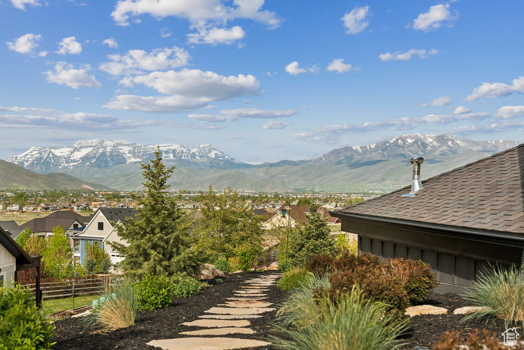 View of mountain background featuring nearby suburban area