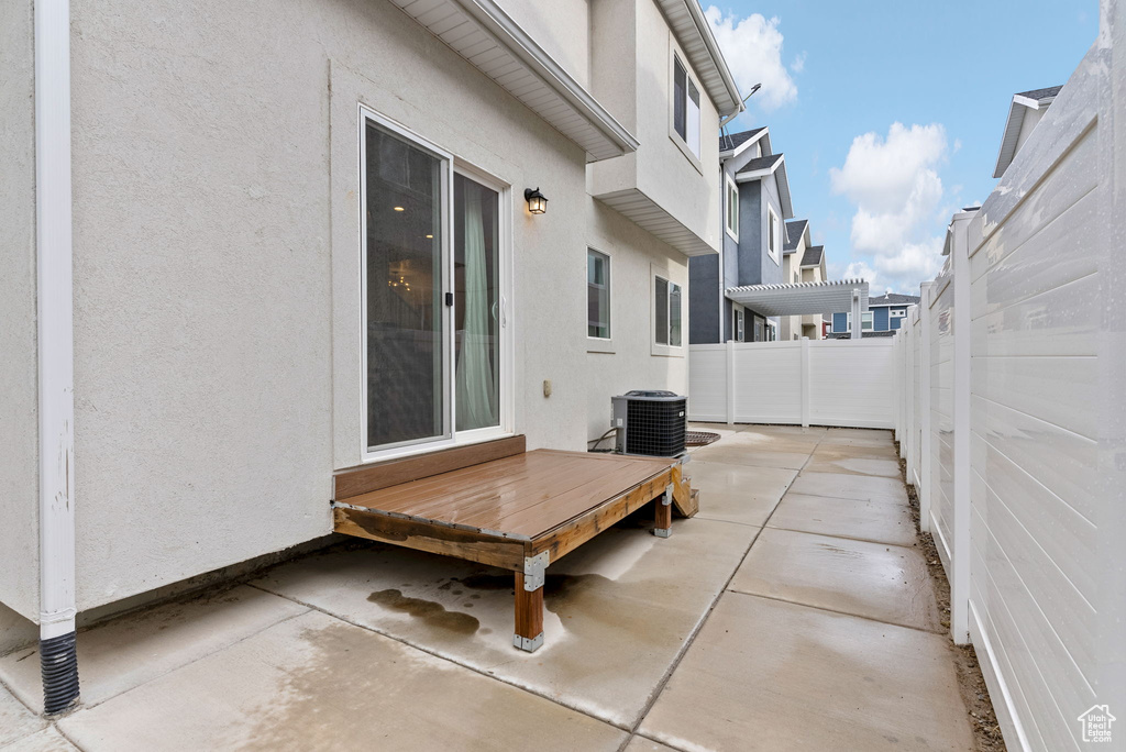 View of patio featuring central AC