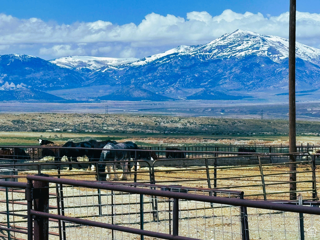 View of mountain background featuring rural landscape and agricultural land