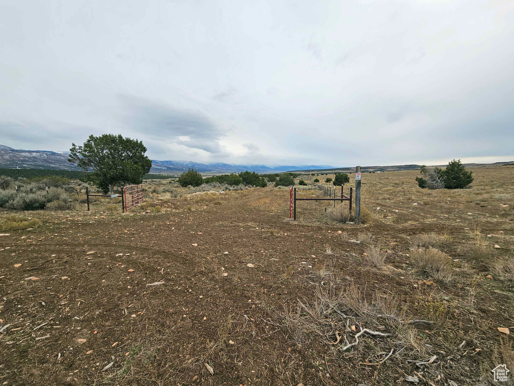 Surrounding community featuring a rural view and a mountain view