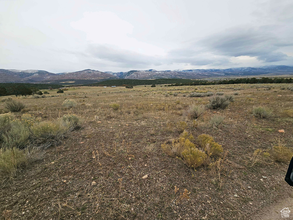 Property view of mountains featuring a rural view