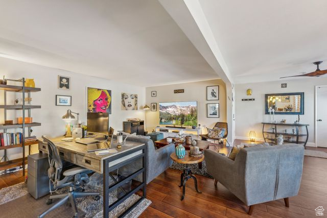 Living room with hardwood / wood-style floors