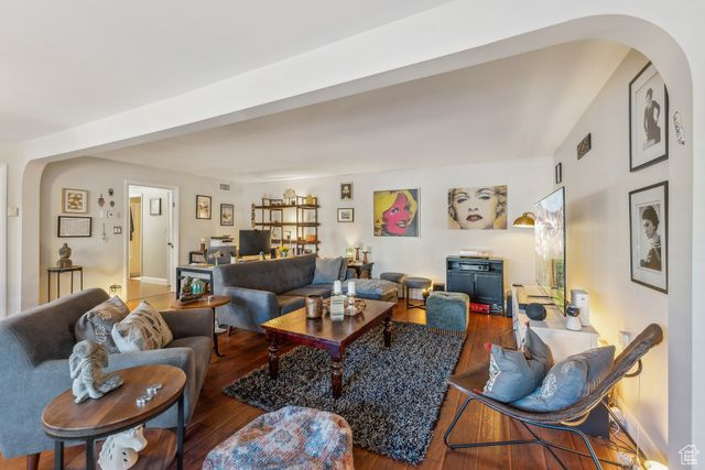 Living room with hardwood / wood-style floors