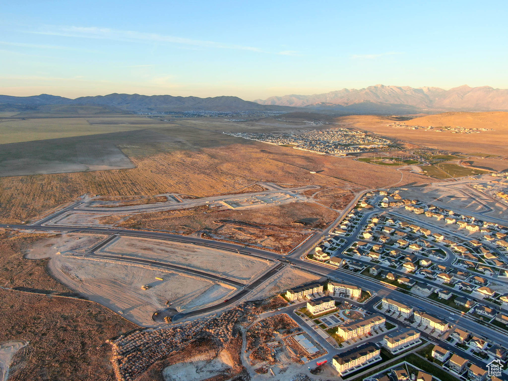 Aerial view at dusk featuring a mountain view