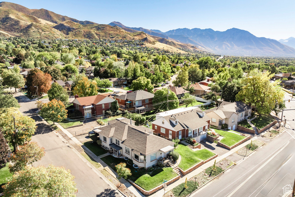 Birds eye view of property with a mountain view