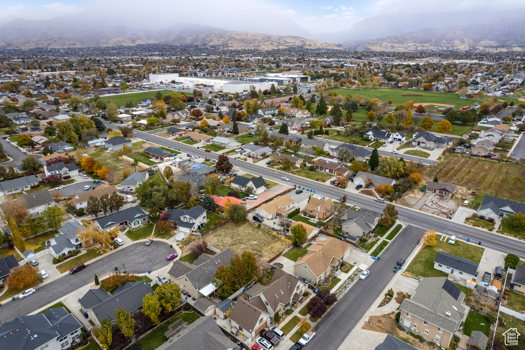 Birds eye view of property featuring a mountain view