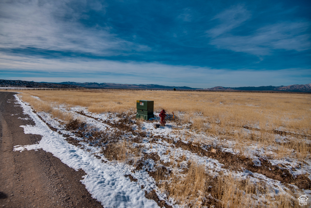 Exterior space with a mountain view and a rural view