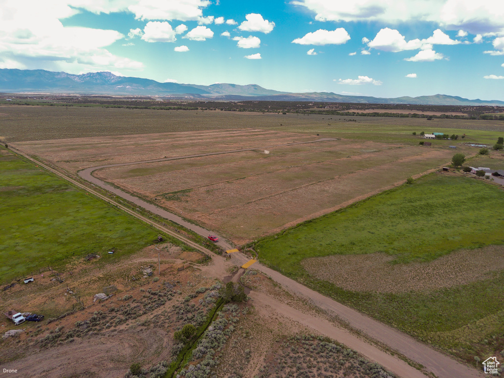 Overview of rural landscape with a mountainous background