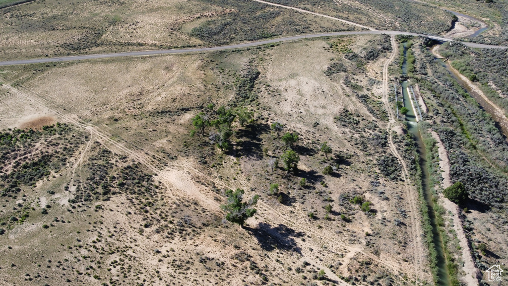 Aerial overview of property's location featuring rural landscape and a desert landscape