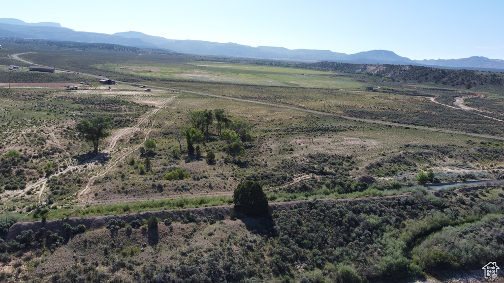 View of mountain background featuring rural landscape