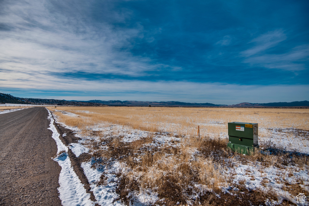 Exterior space with a mountain view and a rural view