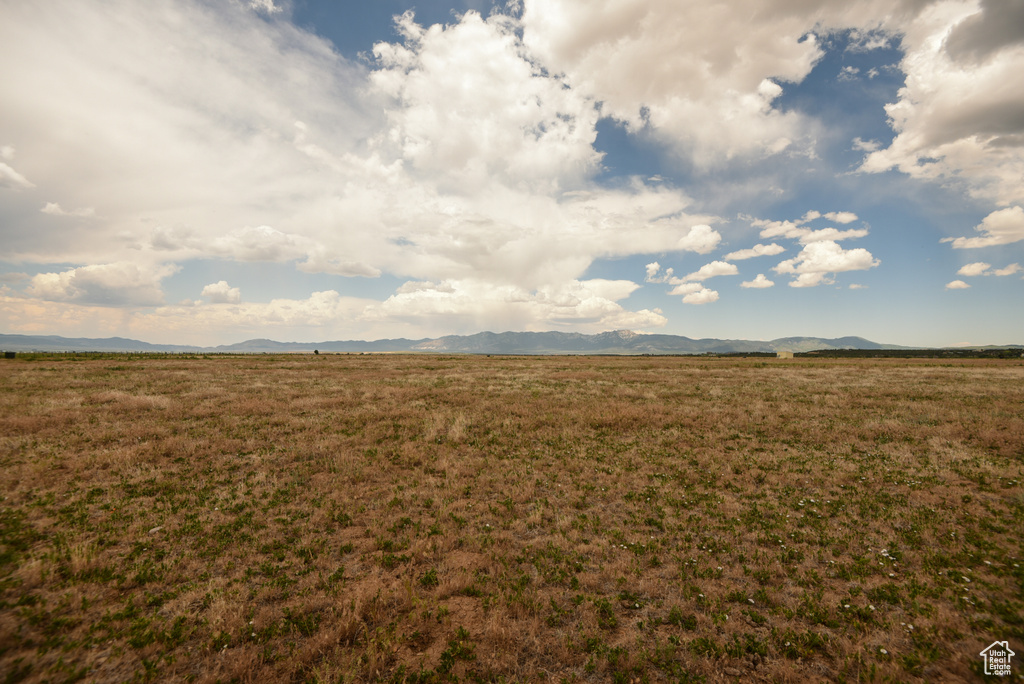 View of yard with a mountain view