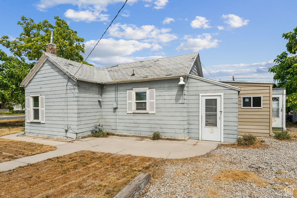 Back of property with a patio area