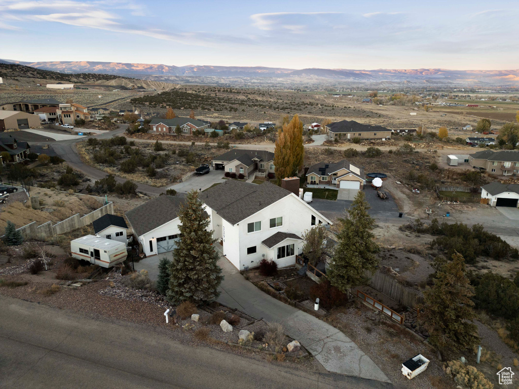 Aerial view at dusk with a mountain view