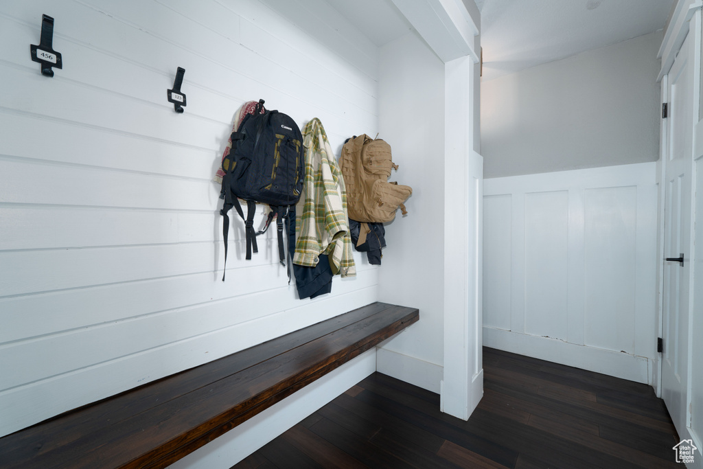 Mudroom with dark hardwood / wood-style flooring