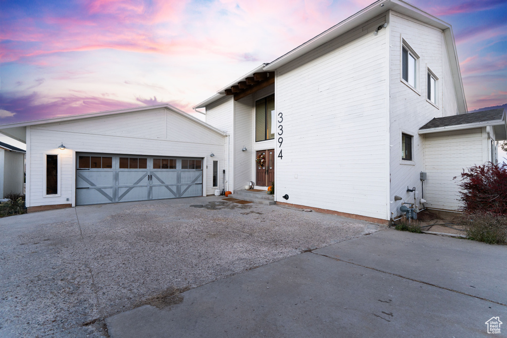 View of front of property with a garage