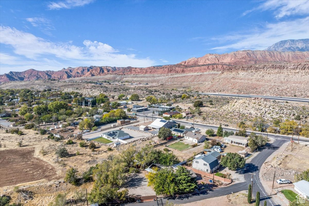 Birds eye view of property featuring a mountain view