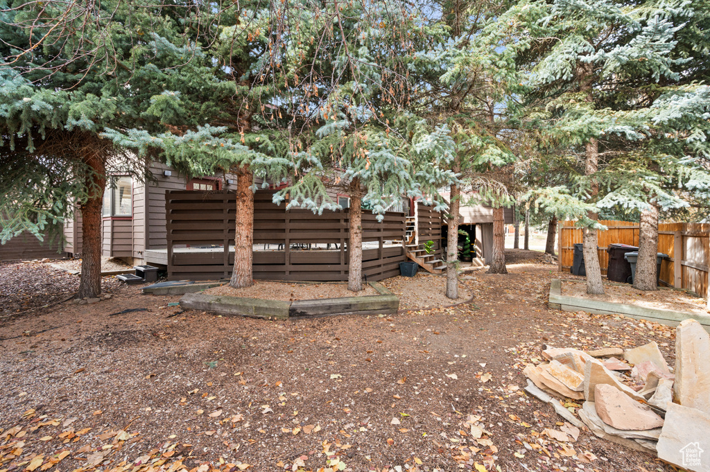 View of yard featuring a deck