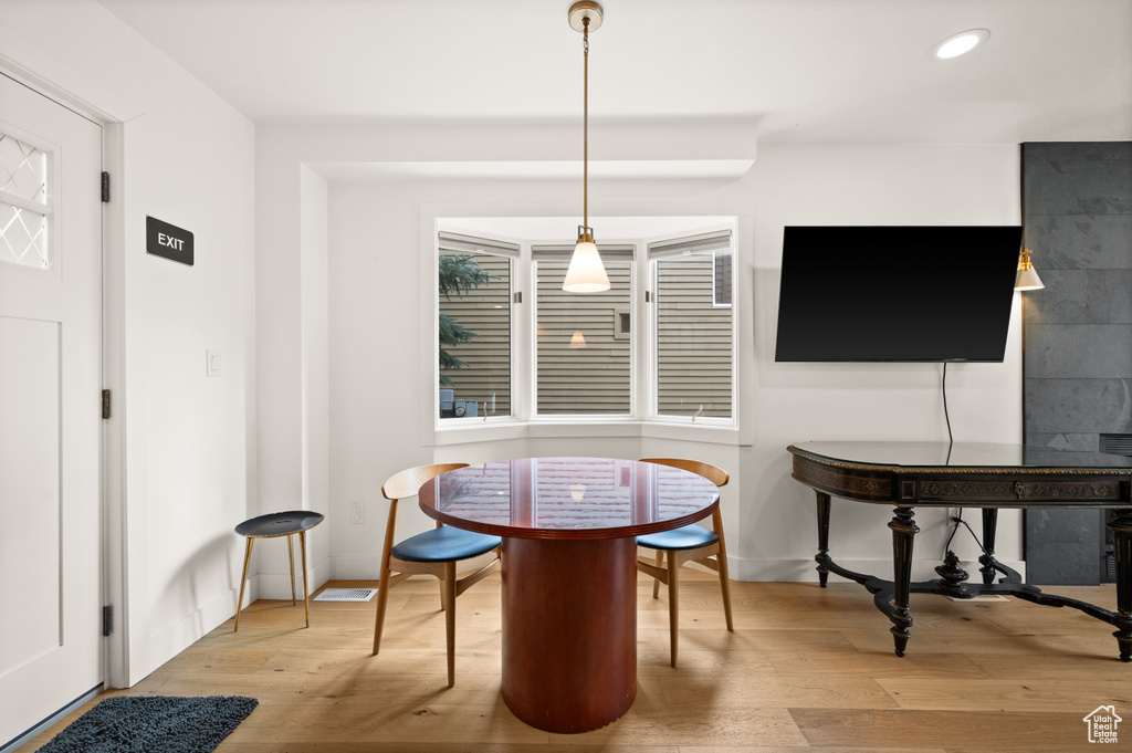 Dining area featuring light hardwood / wood-style floors