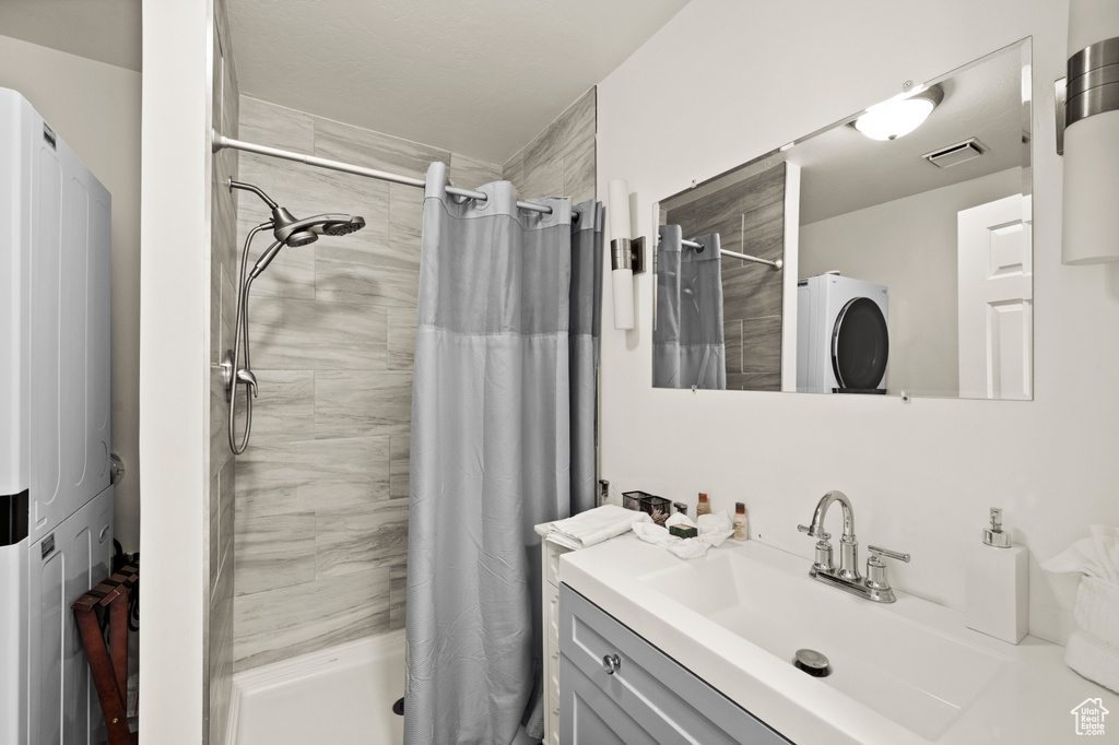 Bathroom featuring vanity and walk in shower