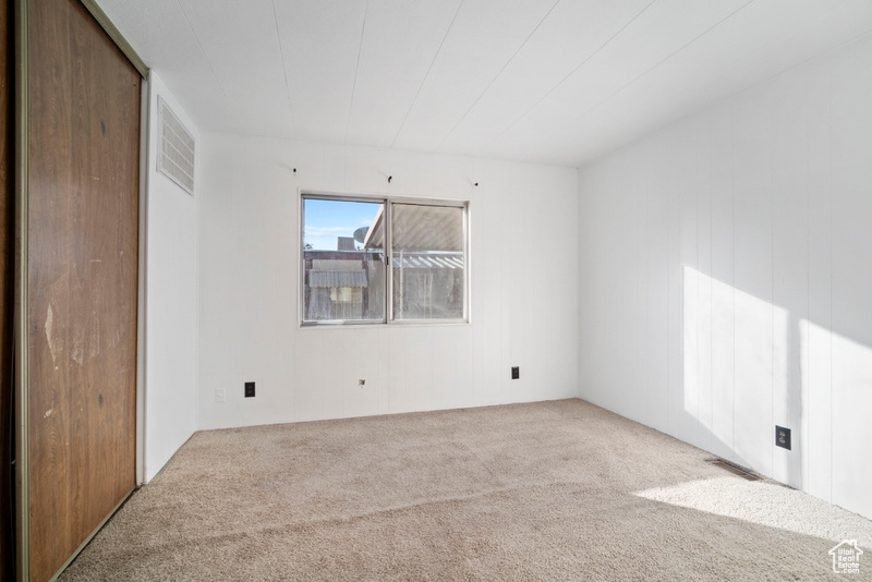 View of carpeted spare room