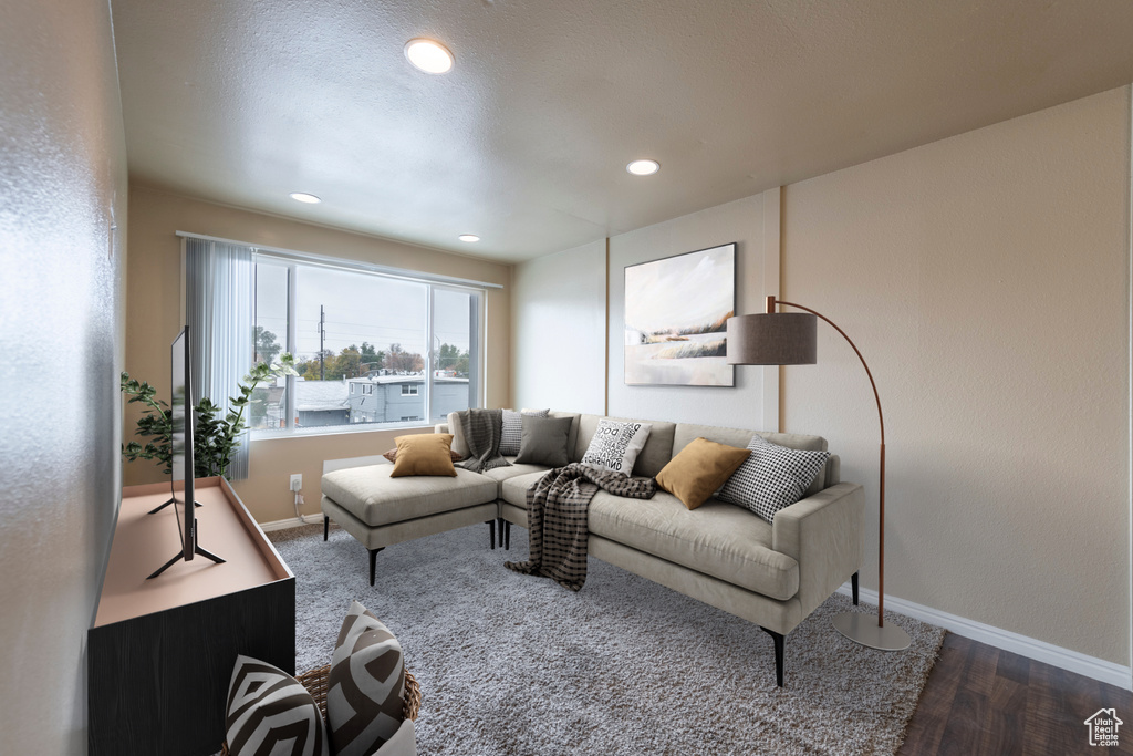 Living room with hardwood / wood-style floors