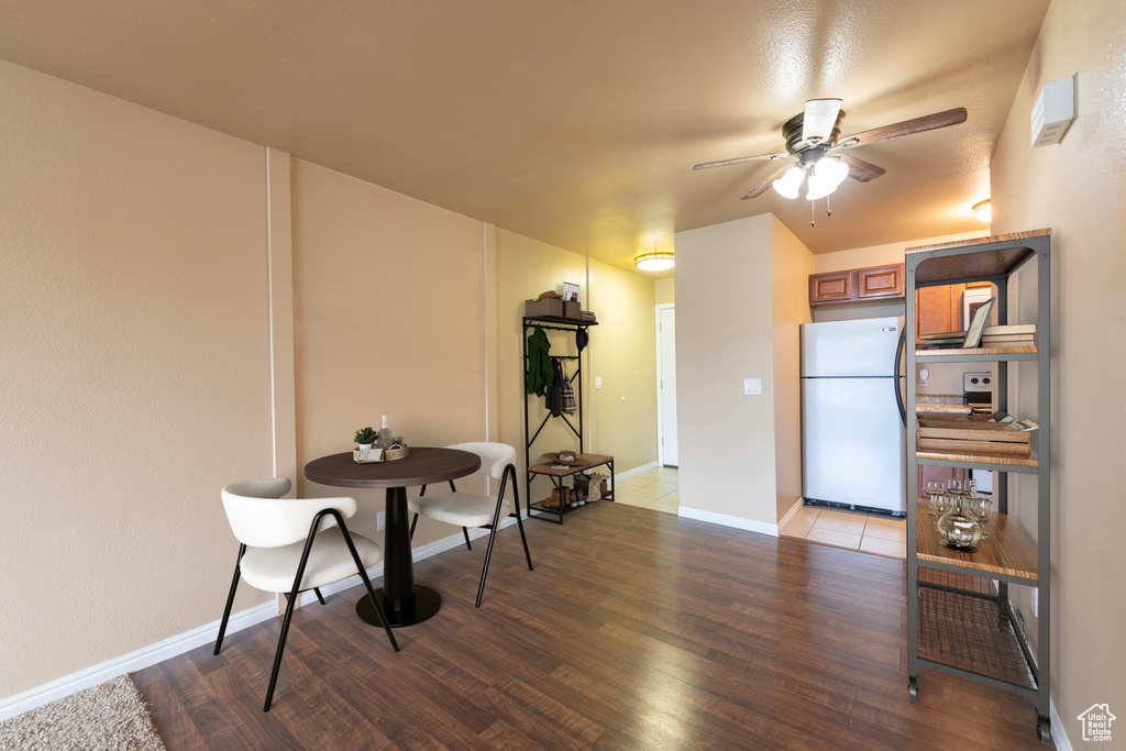 Dining area featuring hardwood / wood-style flooring and ceiling fan