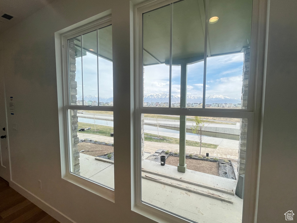 Interior details with baseboards and a water view