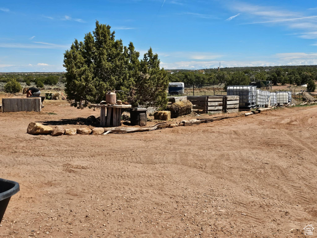 View of yard featuring fence