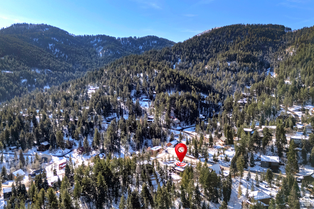 Snowy aerial view with a mountain view