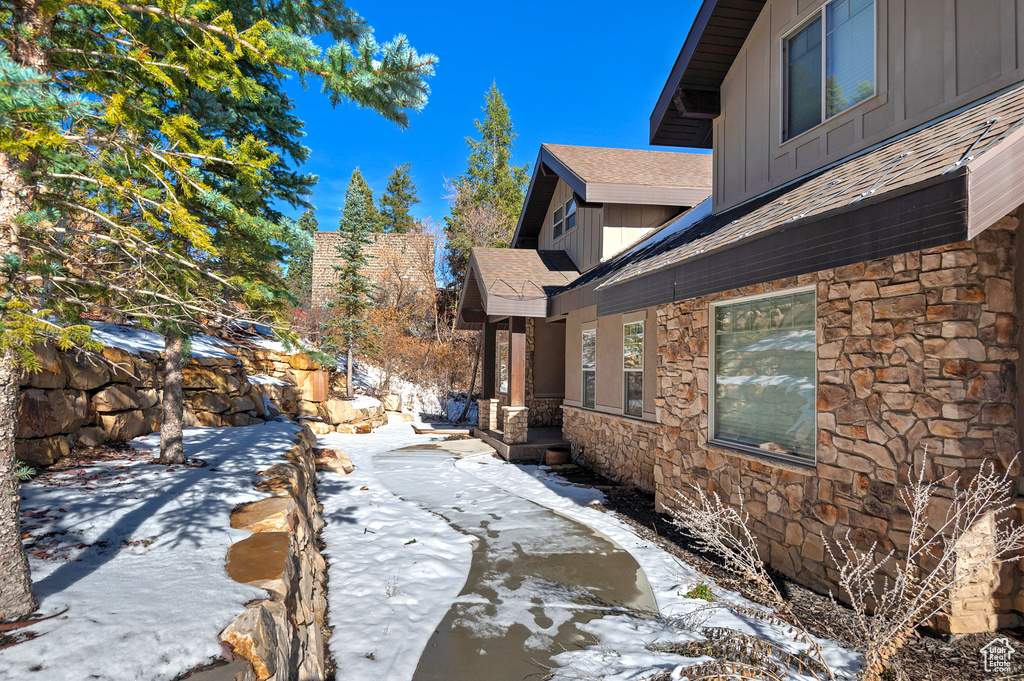 View of snow covered property