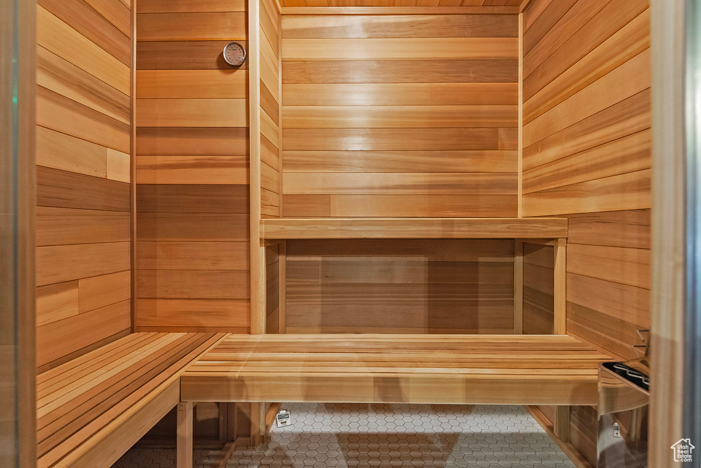 View of sauna featuring wood walls