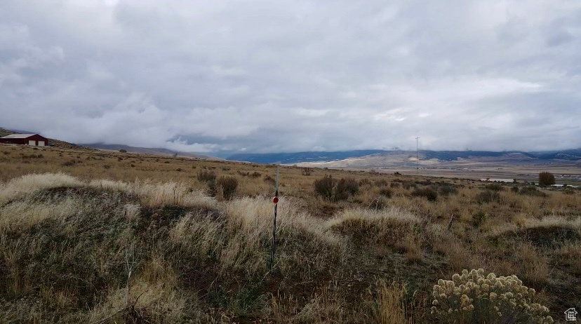 View of mountain feature with a rural view