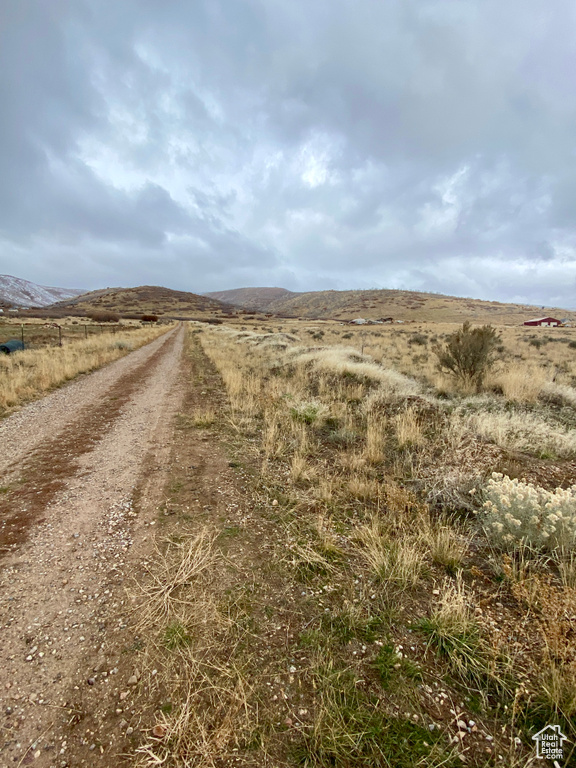View of street featuring a mountain view and a rural view