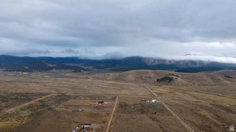 Drone / aerial view featuring a mountain view