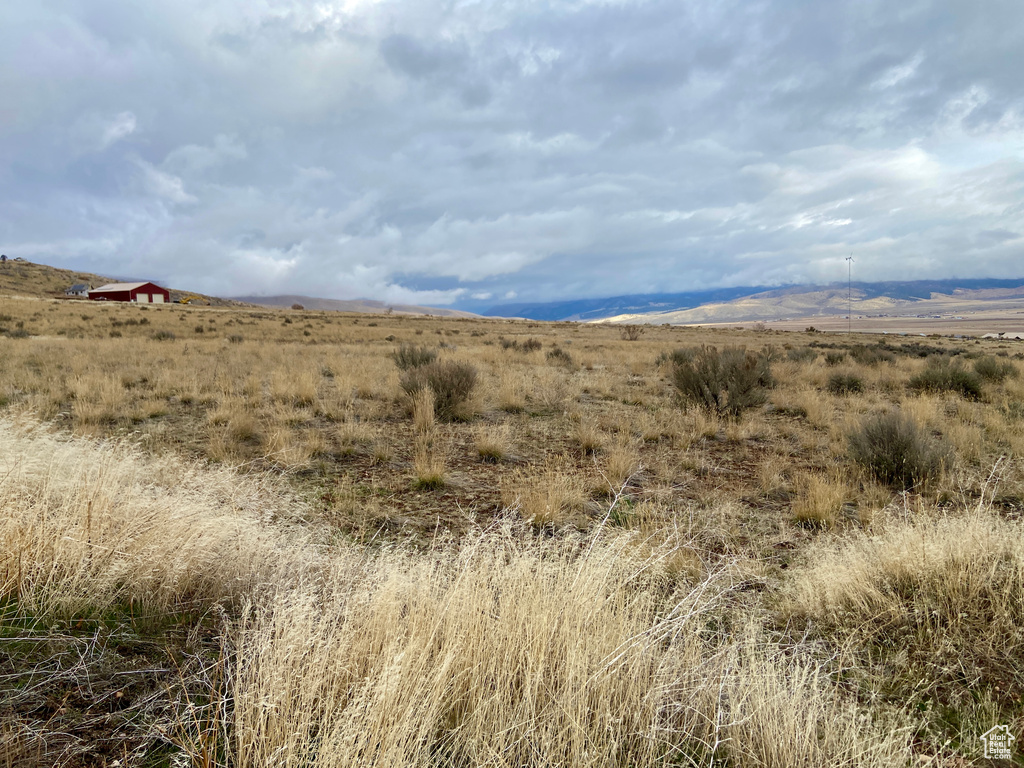 Property view of mountains featuring a rural view