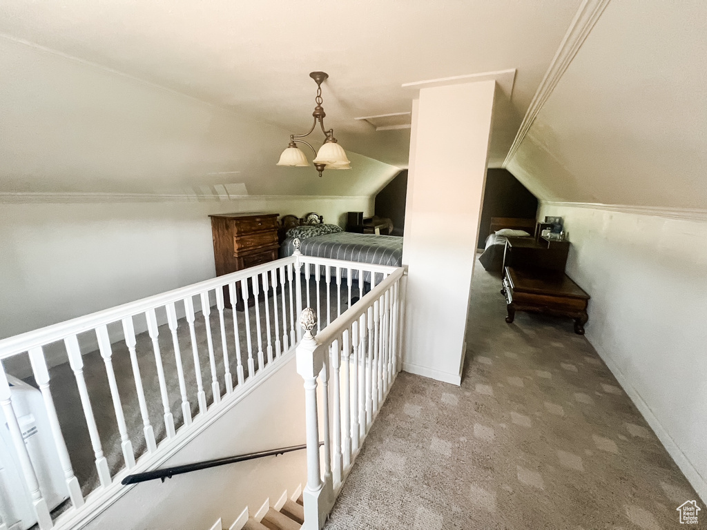 Bonus room featuring carpet and lofted ceiling