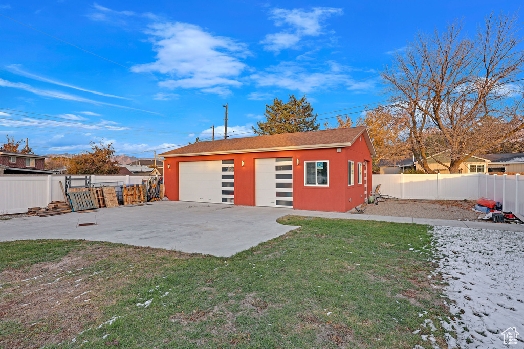 Garage with a lawn