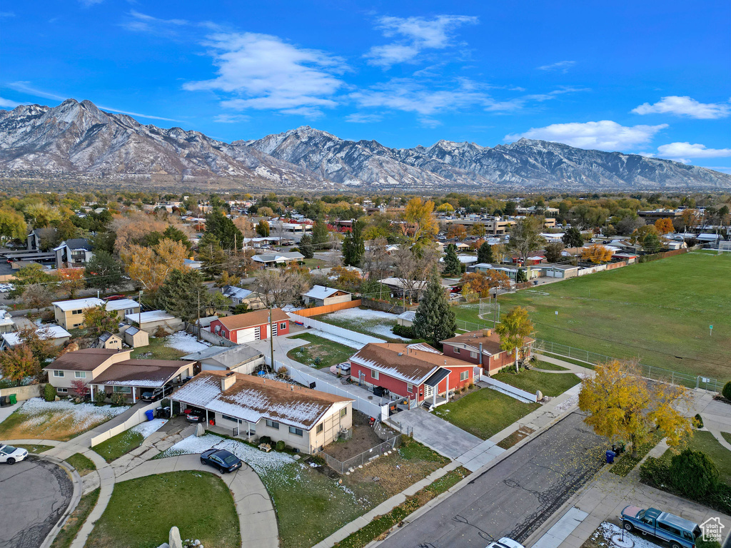 Birds eye view of property with a mountain view