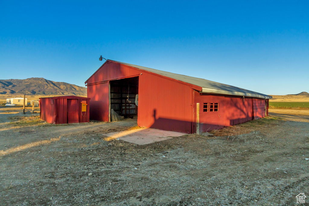 View of outbuilding featuring a mountain view