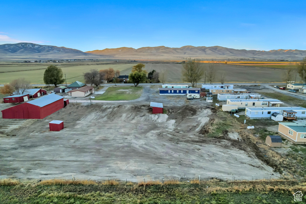 Birds eye view of property with a mountain view