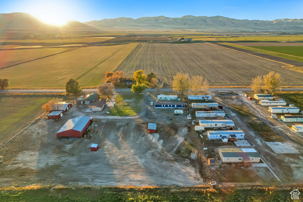 Birds eye view of property with a mountain view