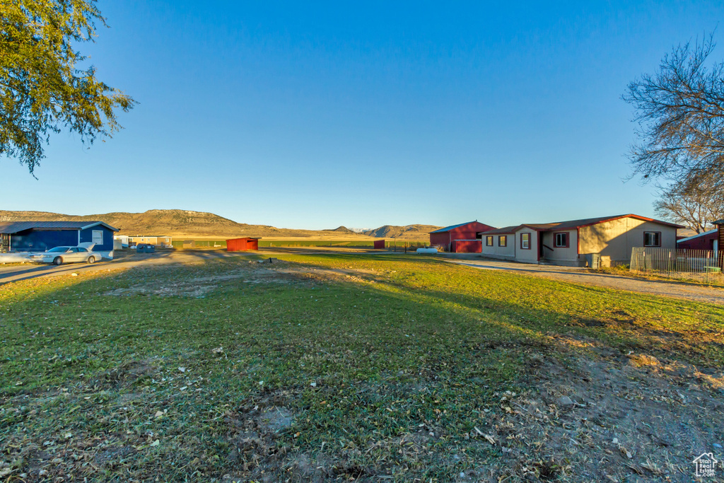 View of yard with a mountain view