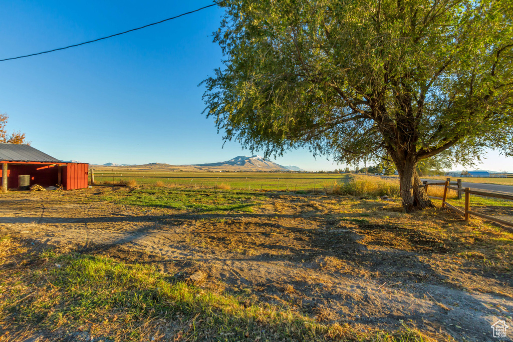 View of yard featuring a mountain view and a rural view