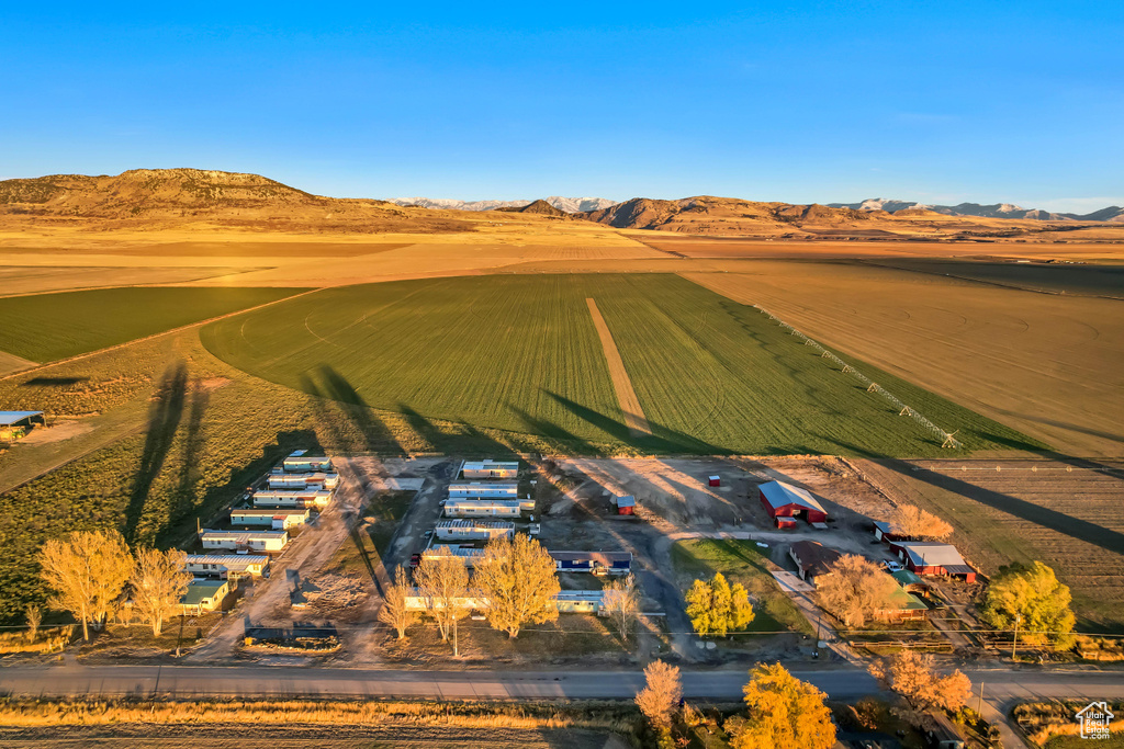 Birds eye view of property with a mountain view