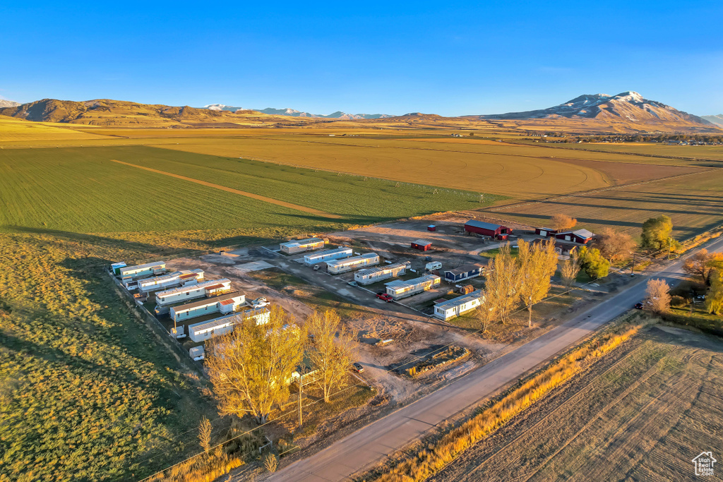 Birds eye view of property with a mountain view and a rural view