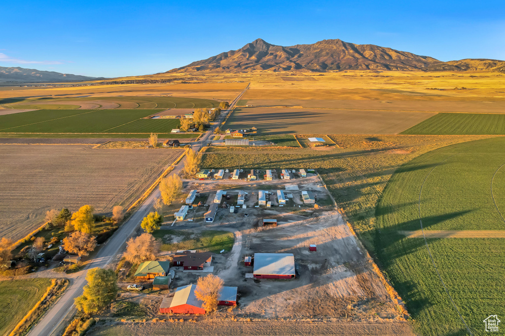 Drone / aerial view with a mountain view and a rural view