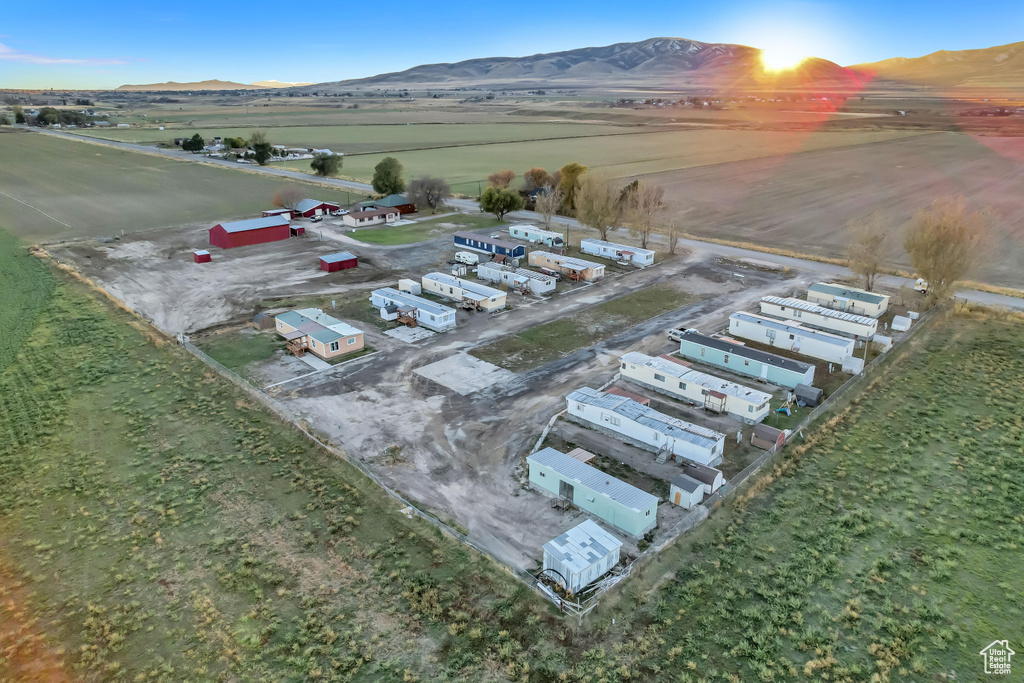 Birds eye view of property with a mountain view