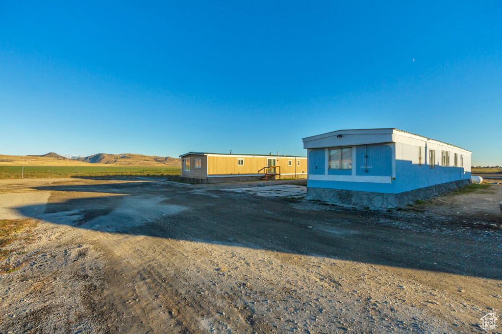 Exterior space featuring a mountain view