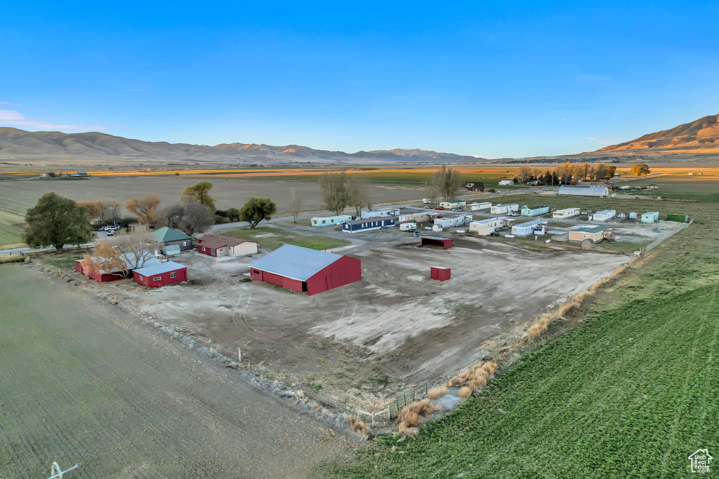 Birds eye view of property with a mountain view